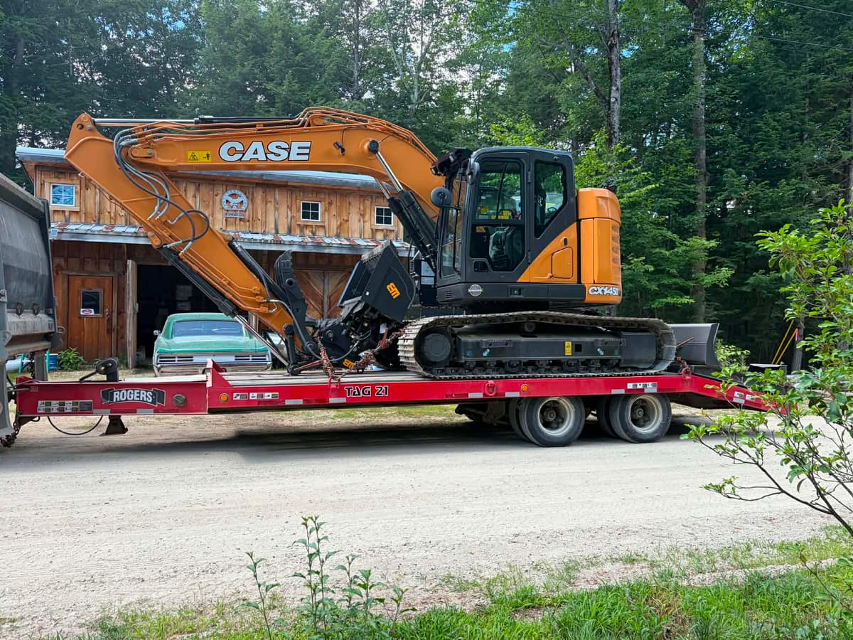 Eldridge Construction excavator staged at the family shop